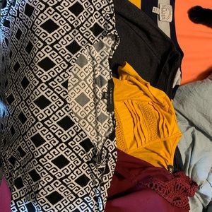 Three short sleeve work shirts.